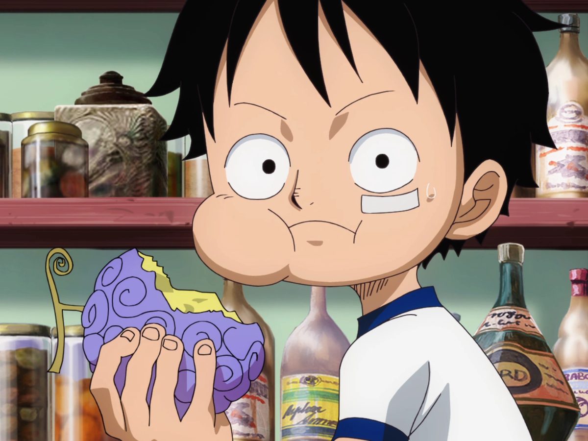 Luffy enfant mangeant le fruit du démon